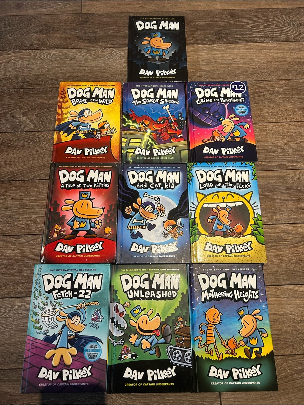 Scholastic Dog Man book set - colorful blue, yellow, red, purple, green covers